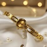 Gold super Ladies Watch Water Resistant (3 year Color Guarantee)